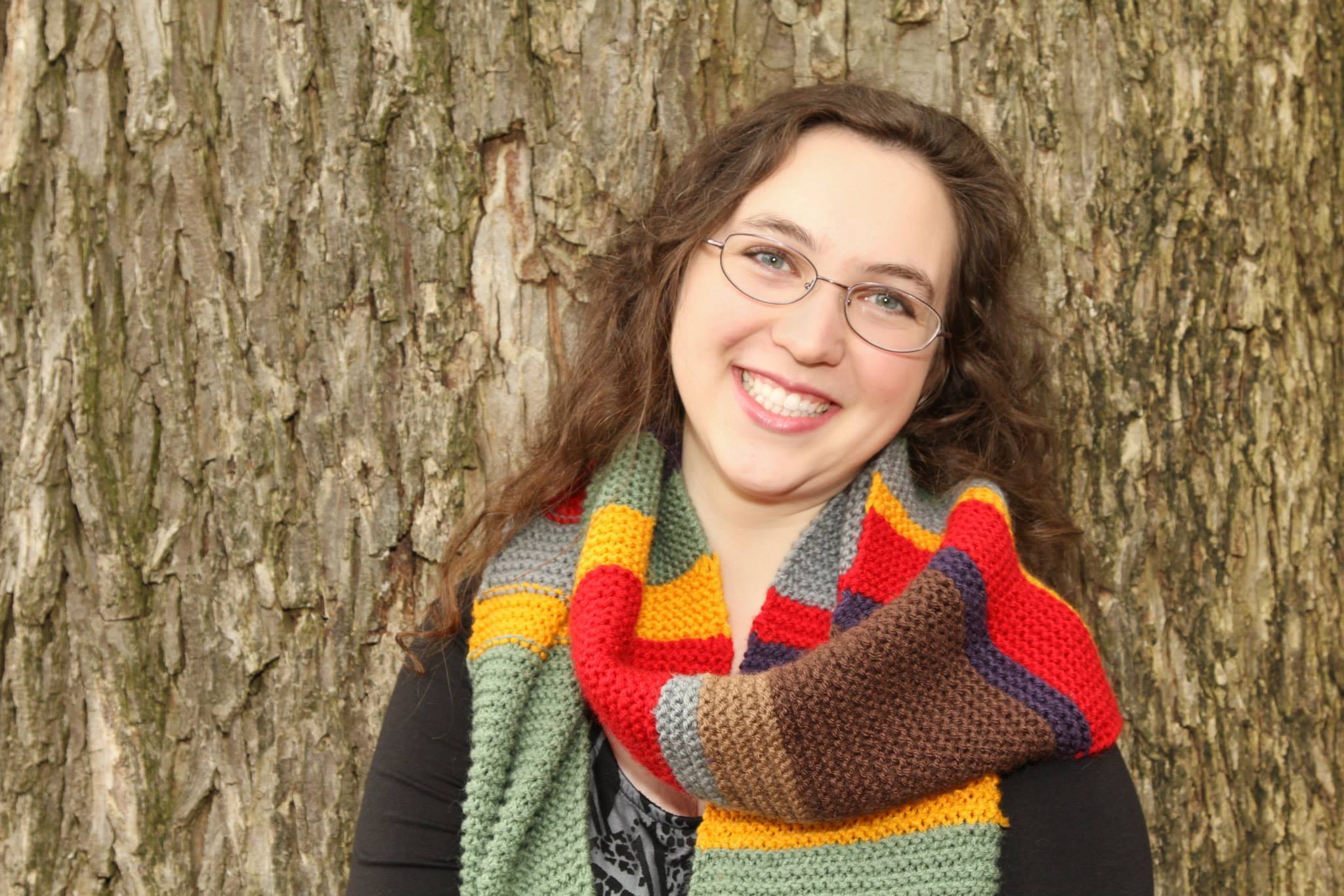 My daughter Elisabeth in her college graduation photos wearing a Tom Baker Dr Who scarf