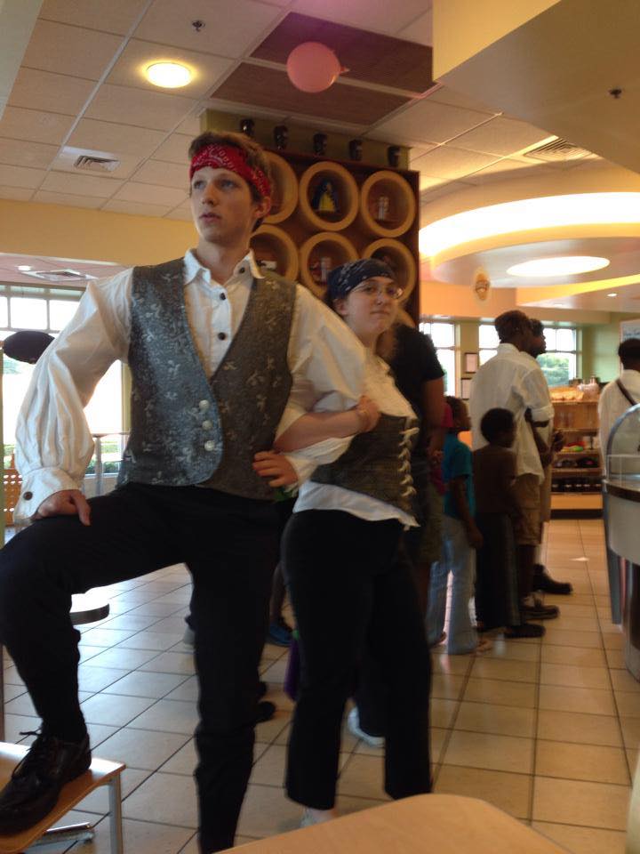 To young adults dressed as pirates